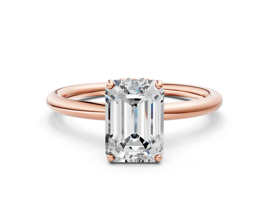 Rose gold Emerald Solitaire Diamond Ring with a Classic Band and Four-Prong Setting