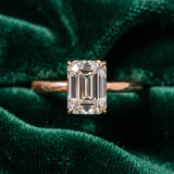 Rose gold Emerald Solitaire Engagement Ring with Cathedral Band and Four-Prong Setting_47