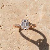 Rose gold Emerald Solitaire Twist Band with Channel-Set Diamonds and Four-Prong Setting_5