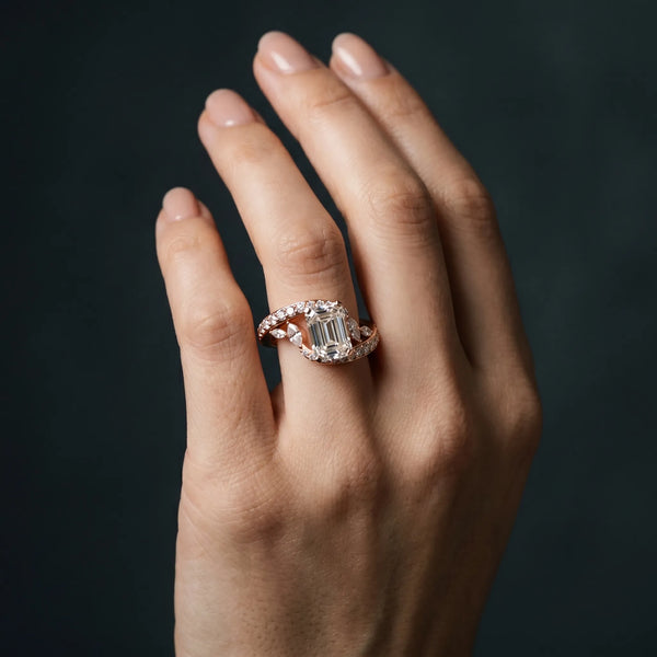 Rose gold Emerald Solitaire with Pavé Twist Band and Four-Prong Setting