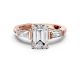 Rose gold Emerald Solitaire with Tapered Baguette Side Stones on a Classic Band with Four-Prong Setting_126