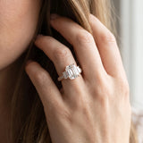 Rose gold Emerald Three-Stone Diamond Ring with Pavé Band and Four-Prong Setting_20