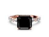 Rose gold Fancy Black Asscher Cut Diamond Solitaire with Side Stones on a Pavé Band and Four-Prong Setting
