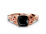 Rose gold Fancy Black Cushion Cut Diamond Solitaire Engagement Ring with Celtic Knot Band and Four-Prong Setting