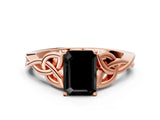 Rose gold Fancy Black Emerald Cut Diamond Solitaire Engagement Ring with Celtic Knot Band and Four-Prong Setting