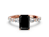 Rose gold Fancy Black Emerald Cut Diamond Solitaire with Side Stones on a Pavé Band and Four-Prong Setting
