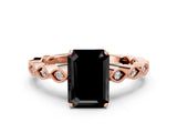 Rose gold Fancy Black Emerald Cut Solitaire Diamond Ring with Infinity Twist Band and Four-Prong Setting