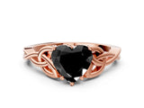 Rose gold Fancy Black Heart Cut Diamond Solitaire Engagement Ring with Celtic Knot Band and Four-Prong Setting