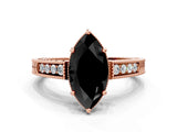Rose gold Fancy Black Marquise Cut Diamond Engagement Ring with Milgrain Channel Set Band and Prong Setting