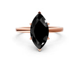 Rose gold Fancy Black Marquise Cut Diamond Solitaire Ring with Classic Band and Four-Prong Setting