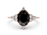 Rose gold Fancy Black Oval Cut Brilliant Diamond with Cluster Setting on a Beaded Band and Four-Prong Setting