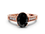 Rose gold Fancy Black Oval Cut Diamond Engagement Ring with Milgrain Channel Set Band and Prong Setting
