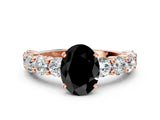 Rose gold Fancy Black Oval Cut Diamond Prong Setting with Side Stones on a Pave Band
