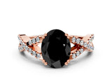 Rose gold Fancy Black Oval Cut Diamond Solitaire Ring with Four-Prong Setting and Twisted Pavé Band