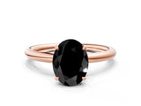 Rose gold Fancy Black Oval Cut Diamond Solitaire Ring with Thin Band and Four-Prong Setting