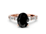 Rose gold Fancy Black Oval Cut Diamond Solitaire with Side Baguettes and Channel Set Band