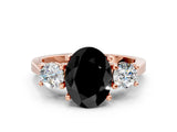 Rose gold Fancy Black Oval Cut Diamond Three-Stone Engagement Ring with Prong Setting and Pavé Band