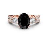 Rose gold Fancy Black Oval Cut Diamond Three-Stone Ring with Pavé Split Shank and Four-Prong Setting