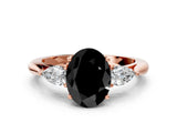 Rose gold Fancy Black Oval Cut Diamond Three-Stone Ring with Pear Side Stones and Four-Prong Setting_24
