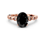 Rose gold Fancy Black Oval Cut Solitaire Diamond Ring with Infinity Twist Band and Four-Prong Setting