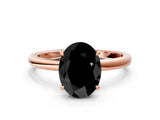Rose gold Fancy Black Oval Cut Solitaire Engagement Ring with Cathedral Band and Four-Prong Setting