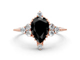 Rose gold Fancy Black Pear Cut Brilliant Diamond with Cluster Setting on a Beaded Band and Four-Prong Setting