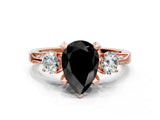 Rose gold Fancy Black Pear Cut Brilliant Three-Stone Diamond Ring with Pavé Band and Four-Prong Setting_3