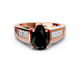 Rose gold Fancy Black Pear Cut Cut Channel Set Solitaire Ring with Four-Prong Setting