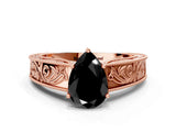 Rose gold Fancy Black Pear Cut Cut Solitaire Engraved Band with Four-Prong Setting
