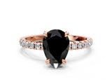 Rose gold Fancy Black Pear Cut Diamond Brilliant Solitaire Ring with Pavé Band and Four-Prong Setting