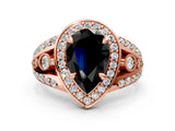 Rose gold Fancy Black Pear Cut Diamond Halo Ring with Split Shank and Bezel Accents and Four-Prong Setting