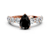 Rose gold Fancy Black Pear Cut Diamond Prong Setting with Side Stones on a Pave Band