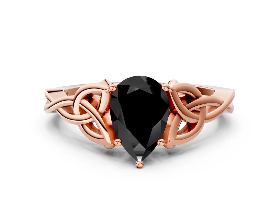 Rose gold Fancy Black Pear Cut Diamond Solitaire Engagement Ring with Celtic Knot Band and Four-Prong Setting