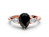 Rose gold Fancy Black Pear Cut Diamond Three-Stone Ring with Pear Side Stones and Four-Prong Setting_24