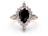 Rose gold Fancy Black Pear Cut Halo Diamond Cluster Ring with Marquise and Round Stones on a White Gold Band with Prong Setting