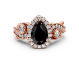Rose gold Fancy Black Pear Cut Halo Diamond Ring with Milgrain and Bezel Accents on a Split Shank Band_12