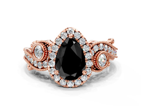 Rose gold Fancy Black Pear Cut Halo Diamond Ring with Milgrain and Bezel Accents on a Split Shank Band