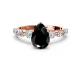 Rose gold Fancy Black Pear Cut Solitaire Diamond Ring with Pave Band and Four-Prong Setting