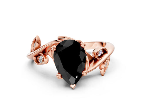 Rose gold Fancy Black Pear Cut Solitaire Twist Engagement Ring with Leaf Accents and Prong Setting_13
