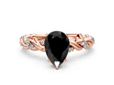 Rose gold Fancy Black Pear Cut Solitaire Twisted Band with Pavé Accents and Four-Prong Setting