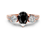 Rose gold Fancy Black Pear Cut Three-Stone Diamond Ring with Pavé Band and Four-Prong Setting