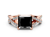 Rose gold Fancy Black Princess Cut Diamond Solitaire Ring with Four-Prong Setting and Twisted Pavé Band