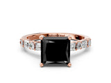 Rose gold Fancy Black Princess Cut Diamond Solitaire with Side Baguettes and Channel Set Band
