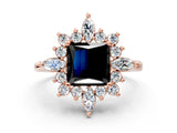 Rose gold Fancy Black Princess Cut Halo Diamond Cluster Ring with Marquise and Round Stones on a White Gold Band with Prong Setting