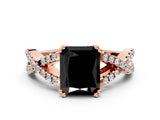 Rose gold Fancy Black Radiant Cut Diamond Solitaire Ring with Four-Prong Setting and Twisted Pavé Band