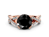 Rose gold Fancy Black Round Cut Diamond Solitaire Ring with Four-Prong Setting and Twisted Pavé Band