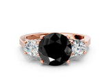 Rose gold Fancy Black Round Cut Diamond Three-Stone Engagement Ring with Prong Setting and Pavé Band