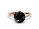Rose gold Fancy Black Round Cut Solitaire Split Shank Pave Diamond Engagement Ring with Four-Prong Setting