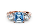 Rose gold Fancy Blue Asscher Cut Diamond Three-Stone Engagement Ring with Prong Setting and Pavé Band