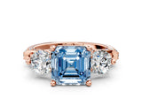 Rose gold Fancy Blue Asscher Cut Diamond Three-Stone Ring with Prong Setting and Pavé Band